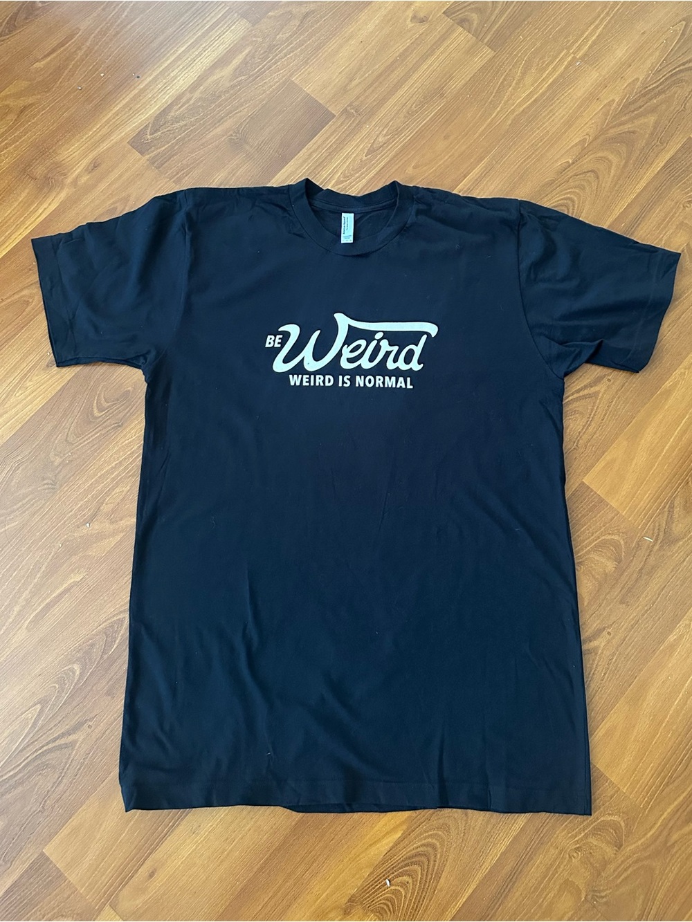 Black American Apparel T-Shirt with Graphic Be Weird, Weird Is Normal Size Large